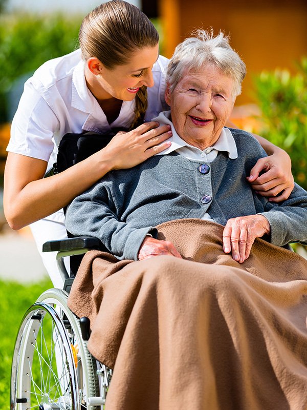 Caregiver and elderly woman