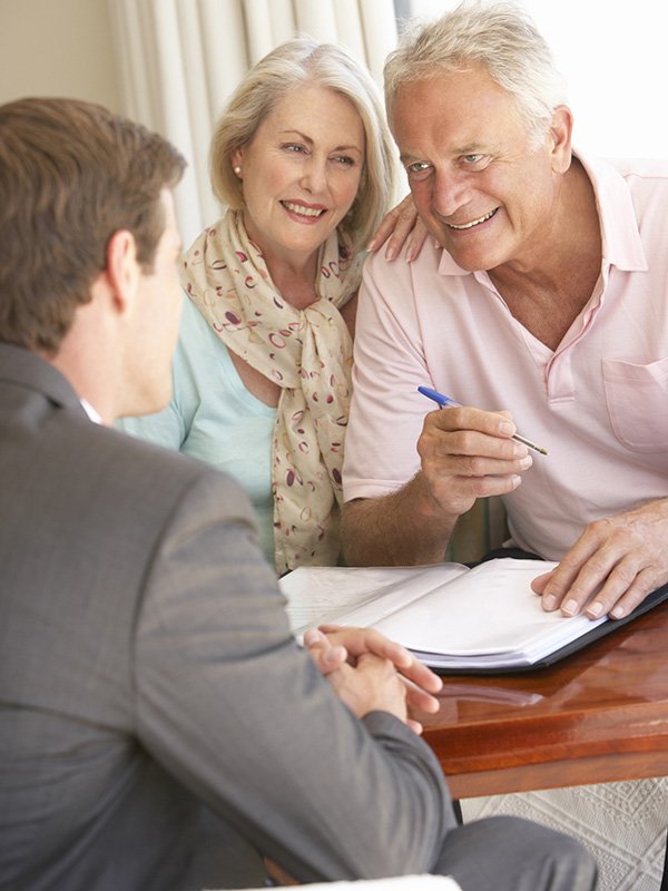 Elderly couple meeting with man
